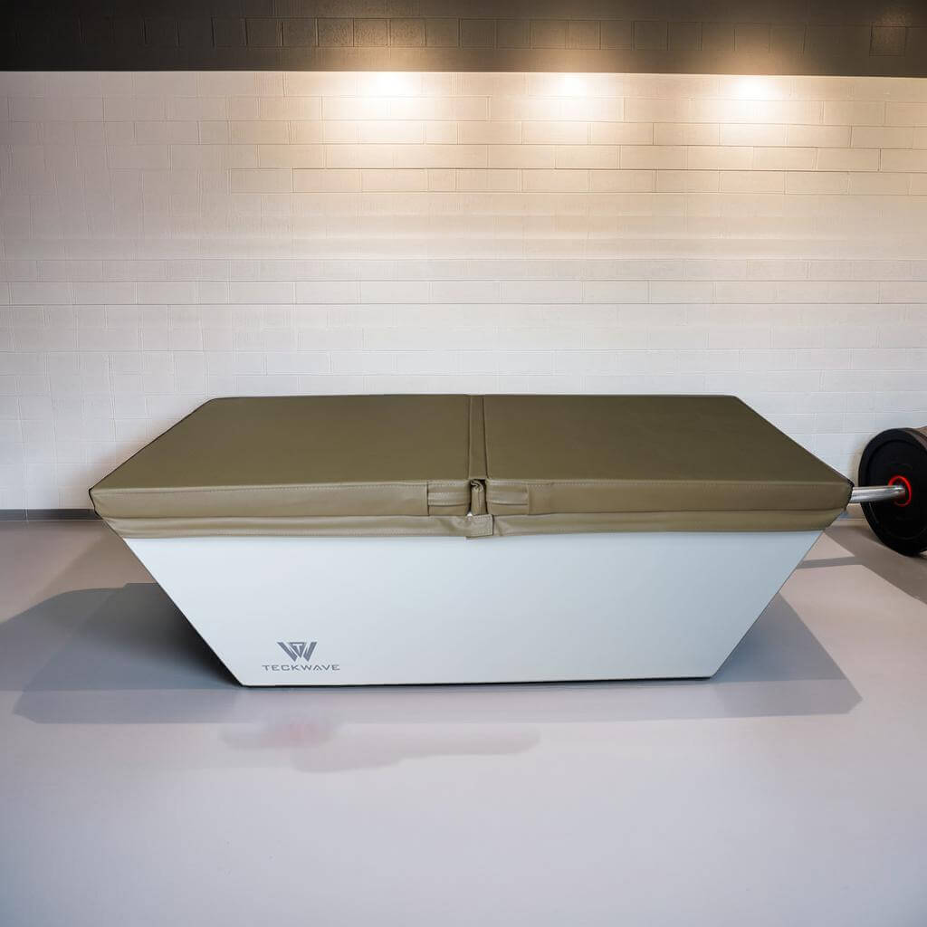 The Elegance ice bath in white with a beige cover, designed for cold plunge therapy and durability.