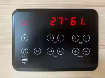 Control panel of UrbanGlow sauna showing temperature and settings.