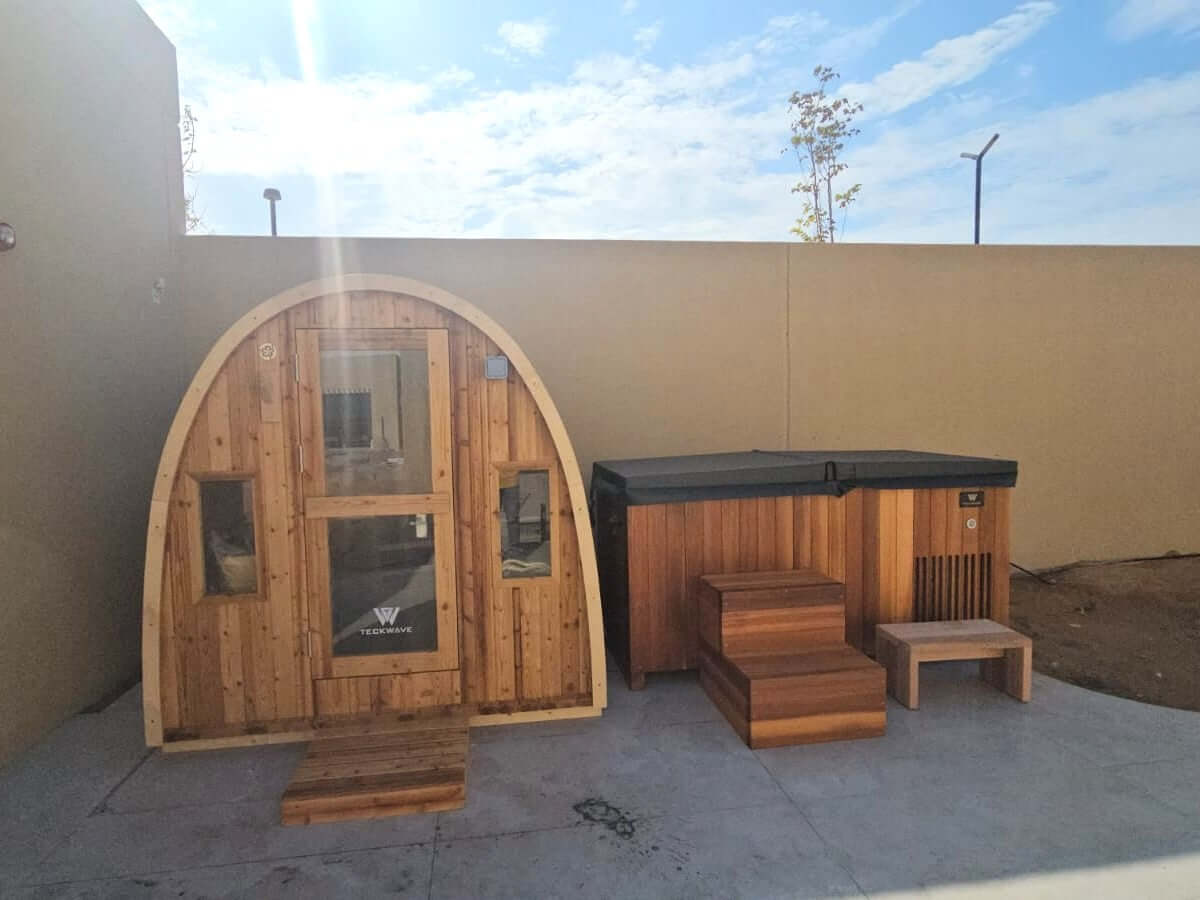 TECKWAVE ThermoElite ARC Sauna next to an Imperial icebath