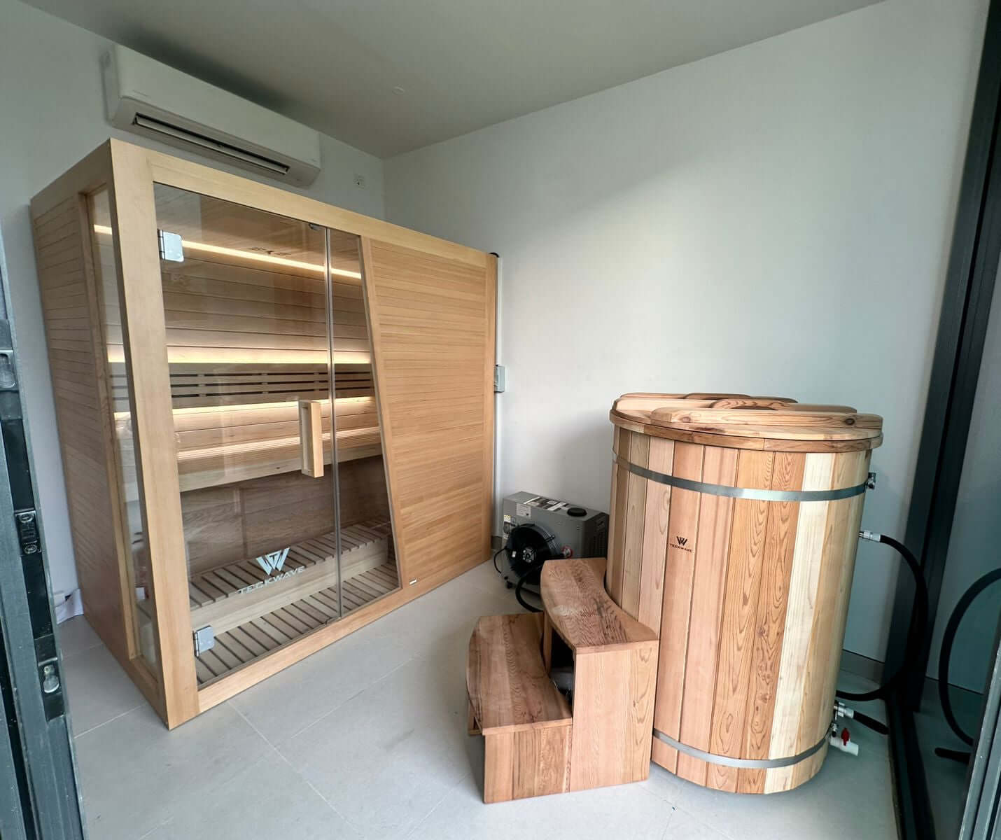 TECKWAVE UrbanRetreat Traditional Sauna next to Artisan barrel in Dubai
